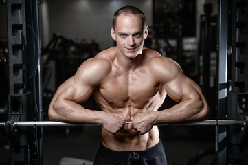 Fototapeta na wymiar young man train in gym healthcare lifestyle sexy caucasian man.