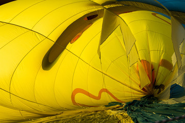 Obraz premium Inside an inflating hot air balloon, abstract colored background into the envelope of the balloon