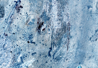 Weathered grungy blue cement wall texture.
