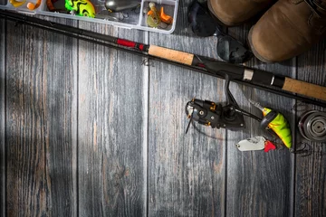 Foto auf Acrylglas fishing background angler wobbler spinning bait concept © REDPIXEL