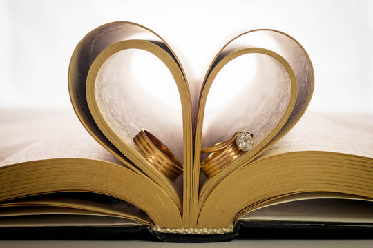 wedding rings in a book