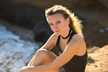 Beautiful blonde girl on the beach