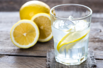Glass of water with fresh lemon juice