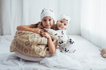Obraz na płótnie Canvas Children in pajamas