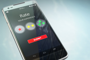 Smartphone or mobile phone with text rate your experience on the screen.  Online feedback rating and review concept.
