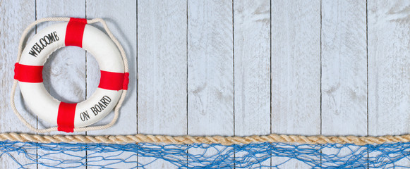 Welcome on Board - lifebuoy with text on horizontal wooden background texture, copy space for...