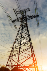 Background of the high-voltage tower in the sunset.
