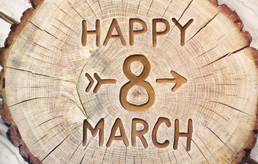 Happy eighth of March. Congratulations to the Women's Day and Mother's. Woodcarving handwork. Background for banner and postcards