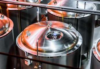 Top metal tank with a manhole.