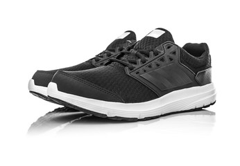 Black unbranded sneakers.