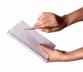 Woman hand with pen and notebook 