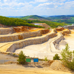 Biggest Czech limestone quarry Certovy Schody. Significant source of air pollution. Aerial view of industrial landscape after mining. Industry and environment in Czech Republic, Europe. 