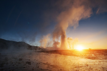 Fantastic sunset Strokkur geyser eruption in Iceland