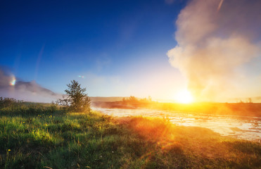 Fantastic sunset Strokkur geyser eruption in Iceland