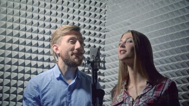 Young singers in recording studio
