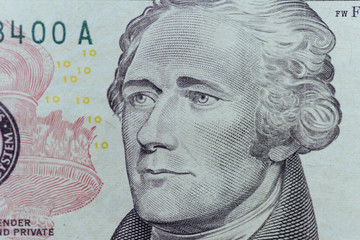 Alexander Hamilton face on US ten or 10 dollars bill macro, unit