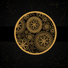 Black card with golden floral circle