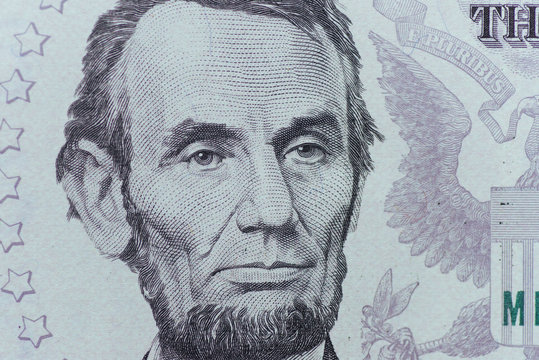 US President Abraham Lincoln Face On Five Dollar Bill Macro, 5 U