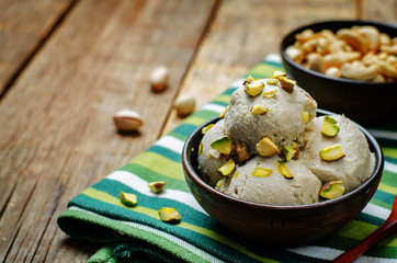 Vegan cashews banana ice cream with pistachios