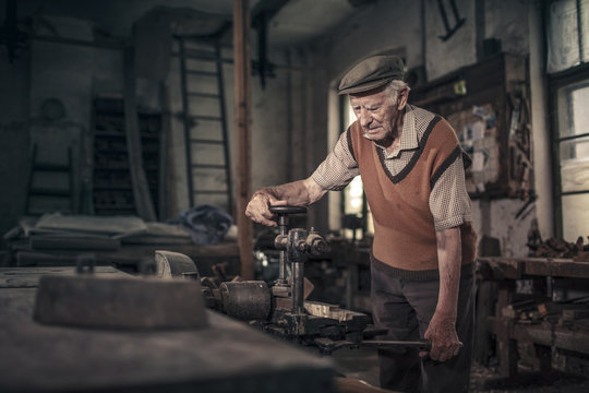 Senior carpenter in his workshop, Karanac, Baranja, Croatia