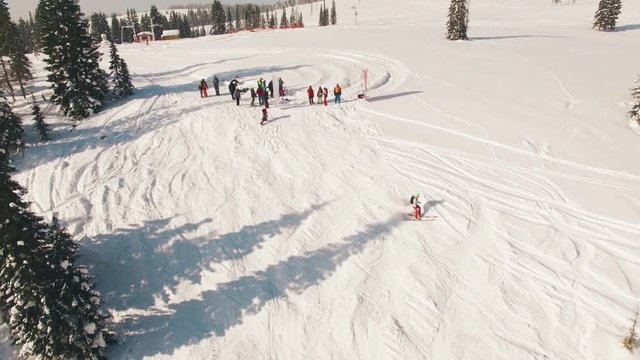 Snowboarding freeriding in forest aerial view