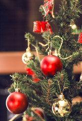 Christmas tree close up. Decorated cristmas tree vintage filter. santa claus tree