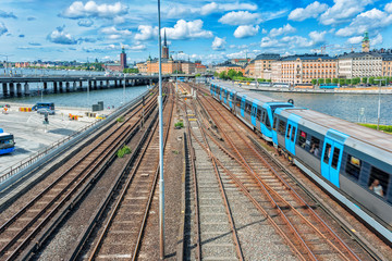Railway tracks and trains in main train station in Stockholm, Sweden