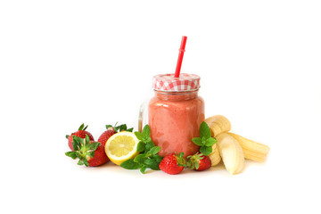 Strawberry smoothie with banana, lemon and mint leaves.