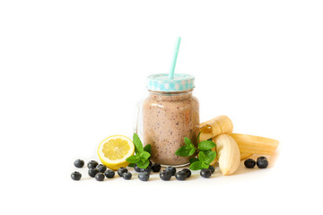 Fototapeta premium Blueberry smoothie with banana, lemon and mint leaves.