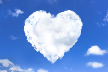 Naklejka na ściany i meble Heart shape clouds - Blue Sky Background. love concept.