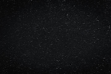 Water drops on dark stone