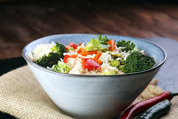 Colorful rice and vegetable salad - fresh mixed colorful healthy vegetarian food