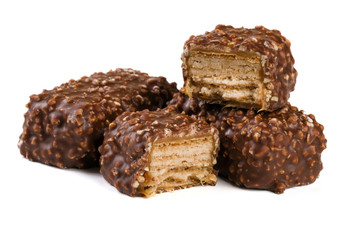 chocolate candy with nuts isolated on white background