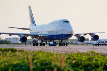 Boeing 747 on the airfield. Long-haul aircraft. Ready to takeoff on the runway. Passenger...