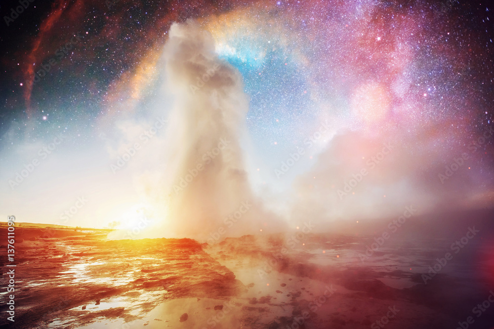 Wall mural Strokkur geyser eruption in Iceland. Fantastic colors