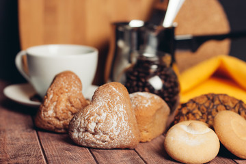 cupcakes on a table, a cup with a drink and a ladle