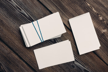 business cards and wooden background