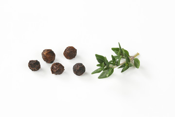 black peppercorns and thyme