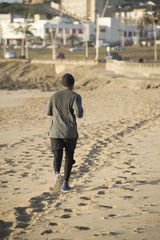 Jogger on Beach from Behind