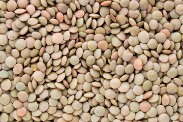 Lentils pulse legumes vegetables vegetarian food background.