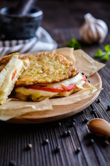 Cauliflower fritters stuffed with Mozzarella cheese and bell pepper slices