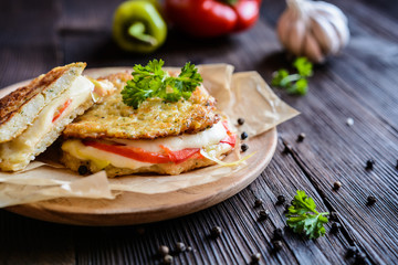 Cauliflower fritters stuffed with Mozzarella cheese and bell pepper slices