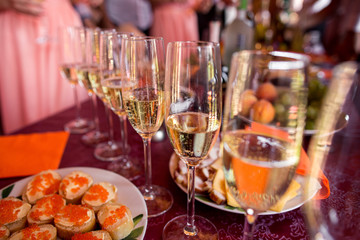 Champagne glasses on table. Celebration concept. Alcohol and cocktail party