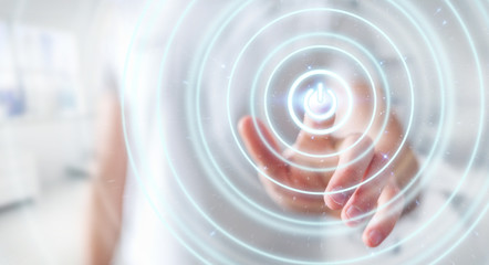 Businessman pushing 3D render power button with his finger