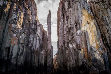 Cape Pillar from the sea in Tasman National Park, Australia