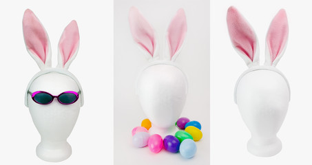 Easter styrofoam mannequin head decorations with sunglasses, colorful plastic easter eggs and furry pink bunny ears. Isolated.