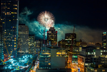 Downtown San Francisco, California, USA.  Cityscape with fireworks at Night.  Transbay terminal construction in the foreground. - 137621480