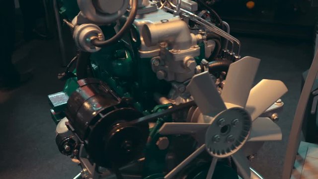 The car's engine is rotating