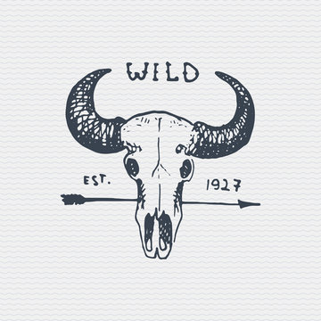 vintage engraved badge, label with buffalo skull, hand drawn old logo