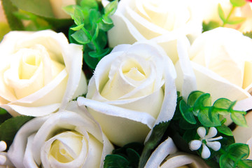 white rose flowers made of fabric.